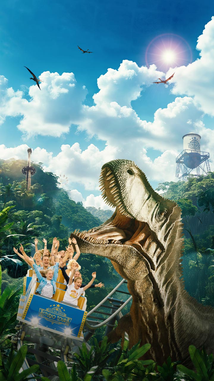 Roller coaster with T-Rex chase and flying dinosaurs in the background.